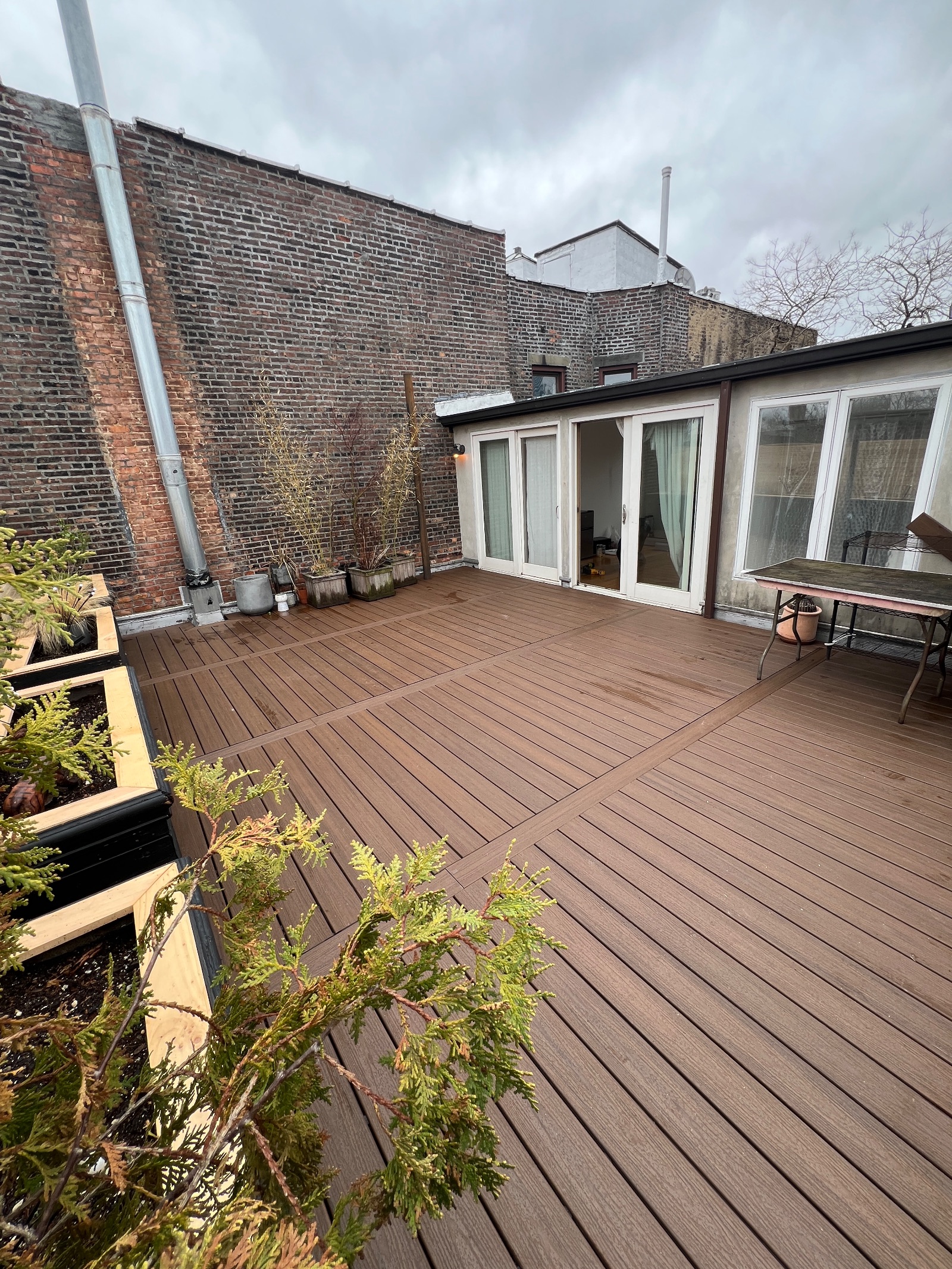 Custom backyard deck construction - Sani Building Corp