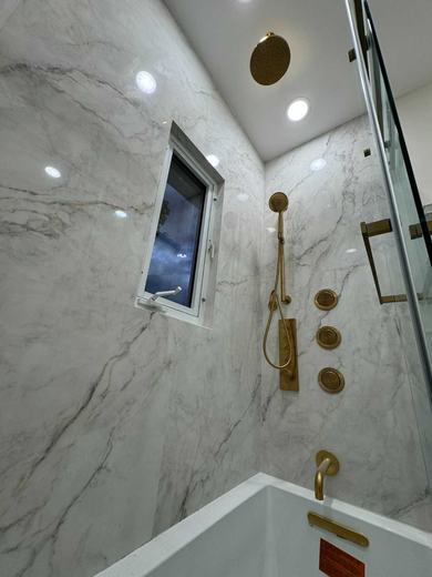 Marble Master Bathroom - NYC renovation by Sani Building Corp